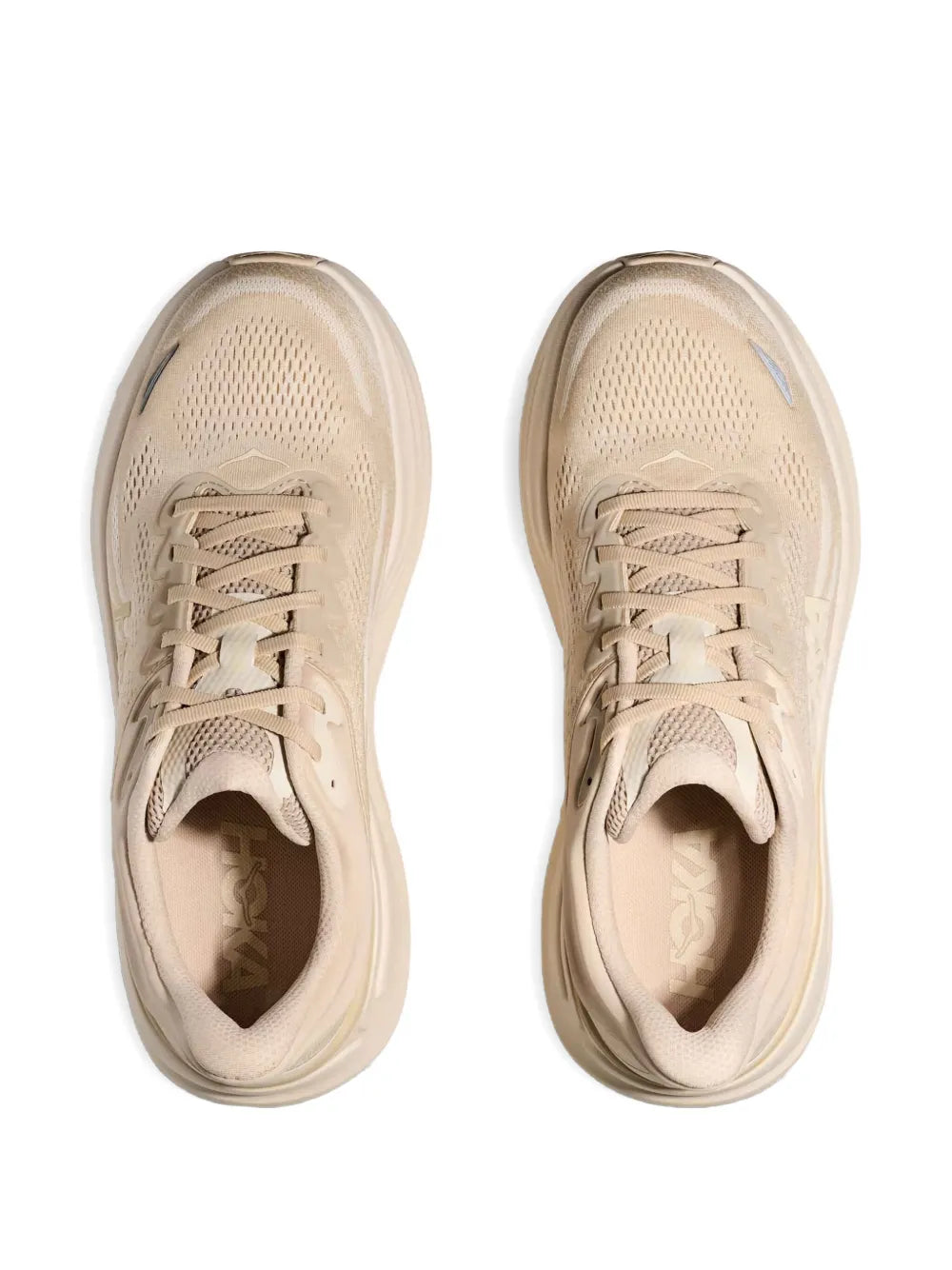 Beige Hoka lace-up sneakers, pair shown from toe with mesh uppers