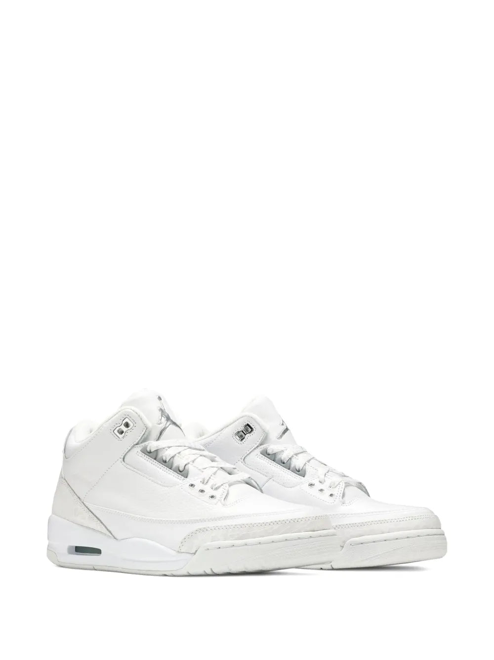 White low-top lace-up sneakers with side panel stitching and air unit detail