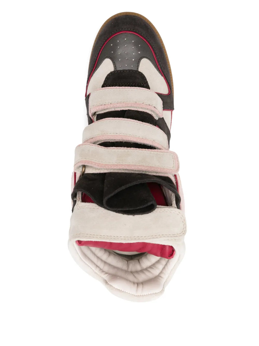 High-top sneaker interior showing cushioned lining, velcro straps, and red trim