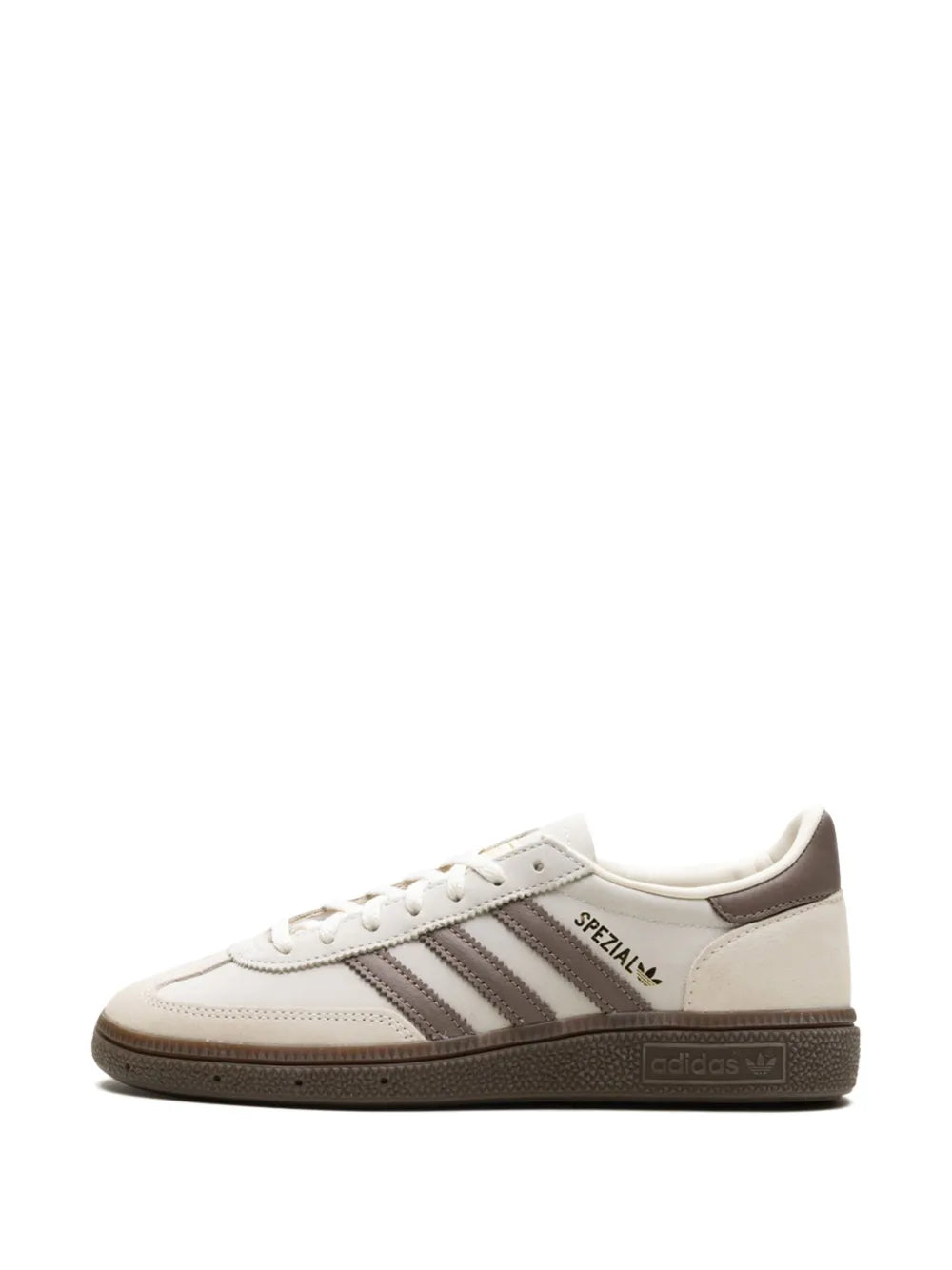 Beige adidas sneakers front view, lace-up with three stripes and gum sole