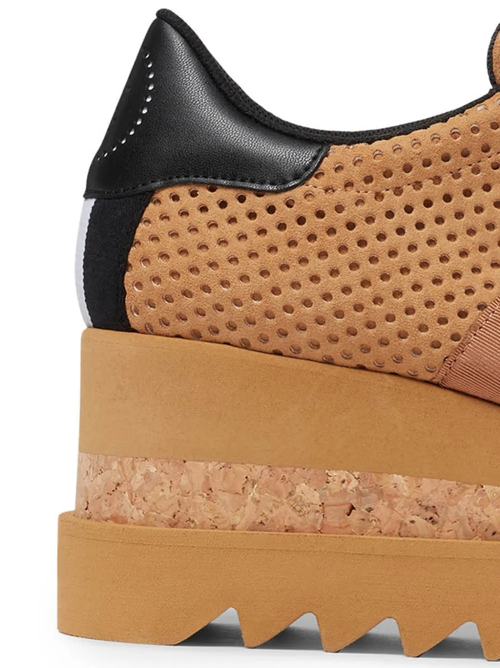Brown perforated platform sneaker with black heel panel and rugged sole tread