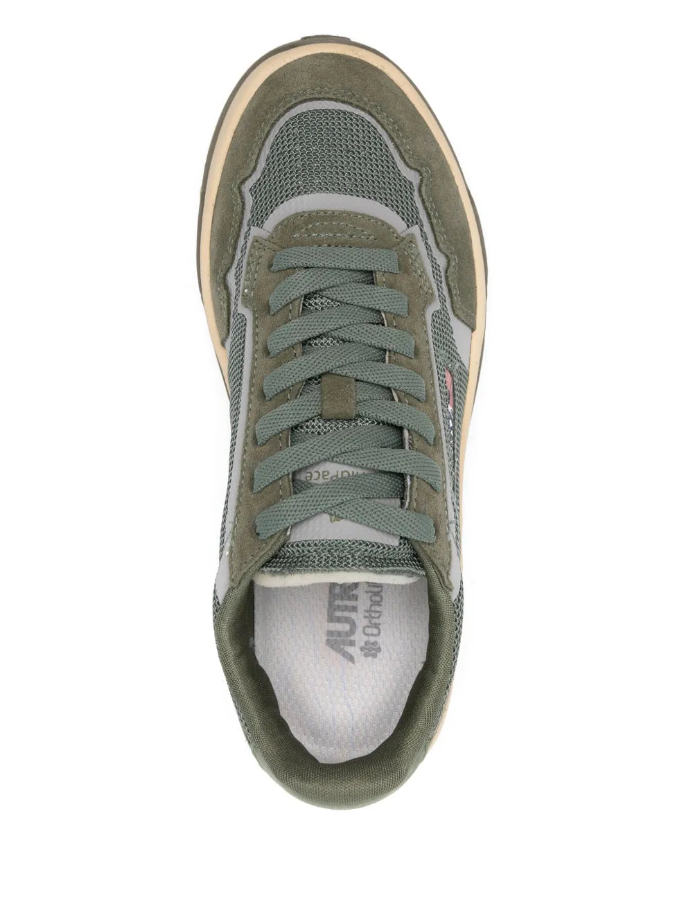Green-gray lace-up sneaker front view with white lining and cream outsole