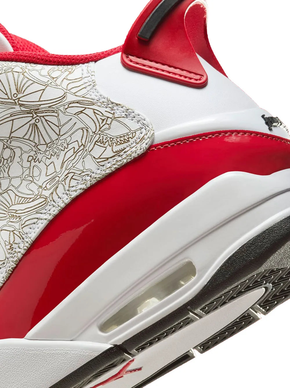 Close-up side view of white and red sneakers with gold line-art and air window