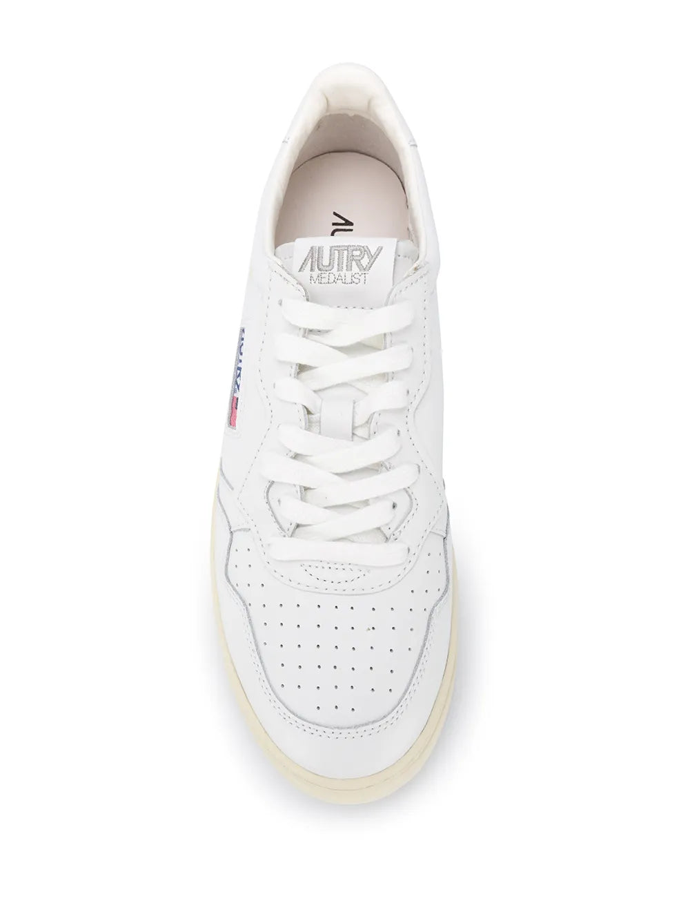 White low-top sneakers front view, lace-up with Autry Medalist stamp inside