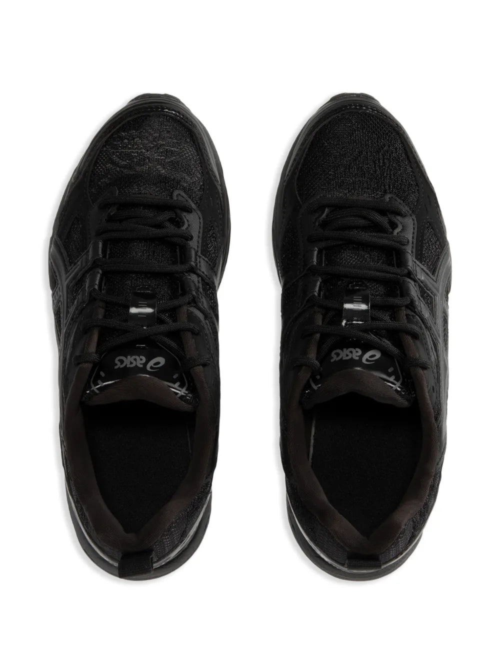 Black lace-up mesh sneakers front view with cushioned tongue and rubber outsole