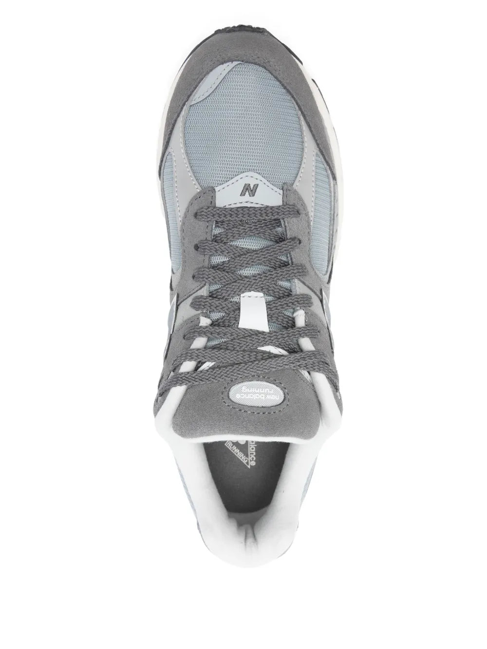 Slate gray New Balance 2002R sneakers, top view with lace-up tongue and eyelets