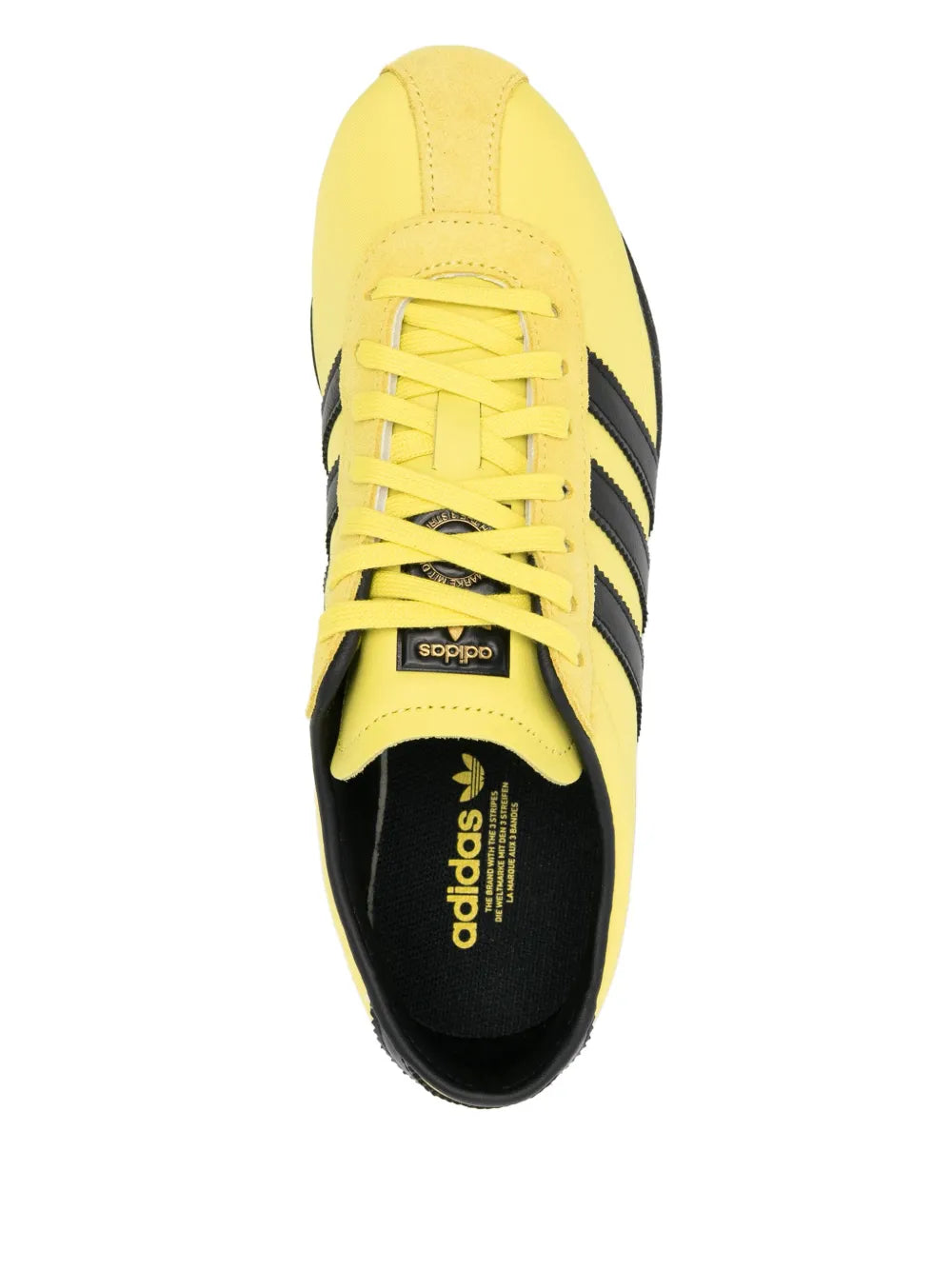 Yellow adidas Tokyo sneaker with yellow laces and black interior lining