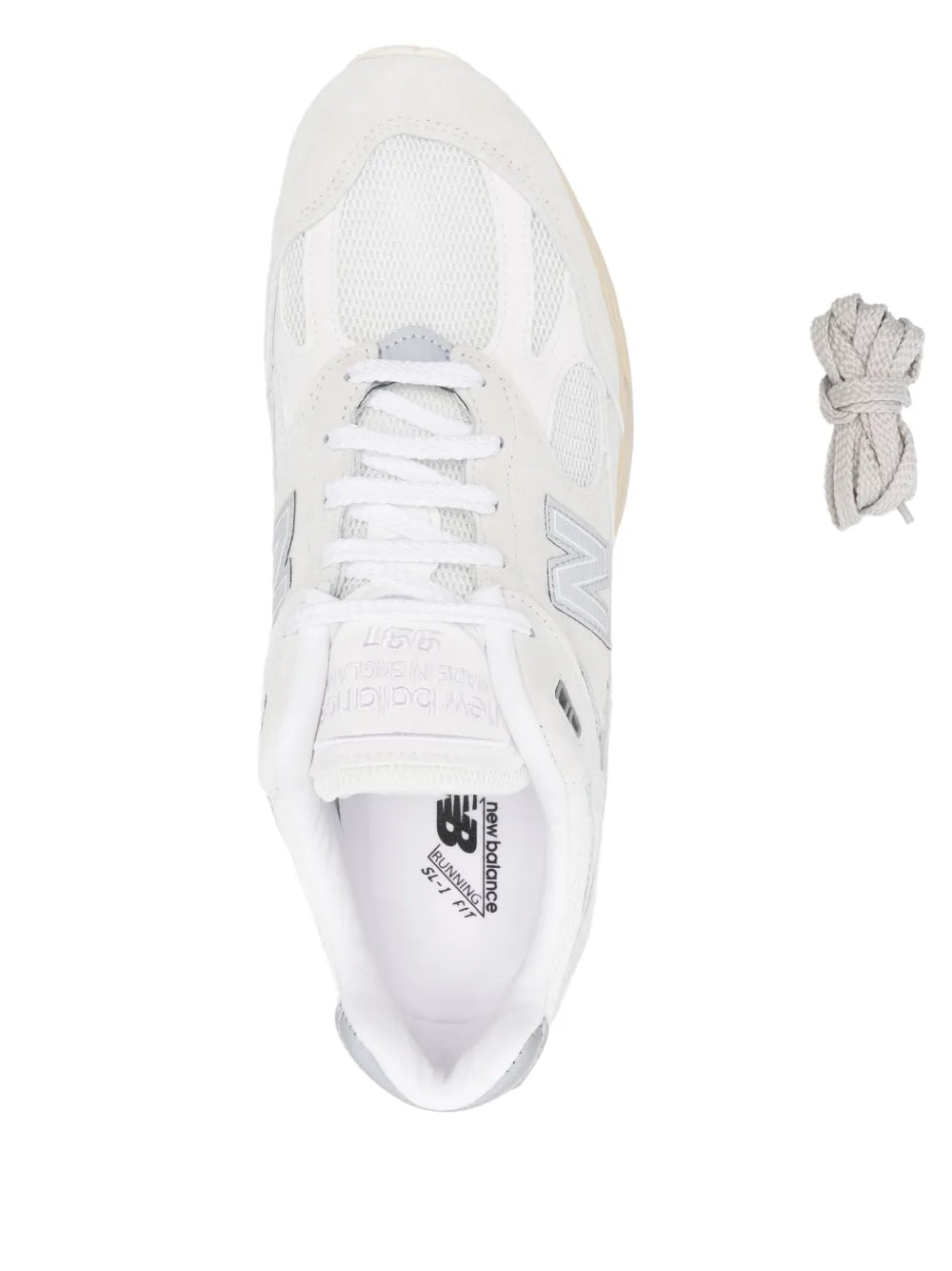 White New Balance 991V2 sneakers with lace-up front and mesh toe, close-up