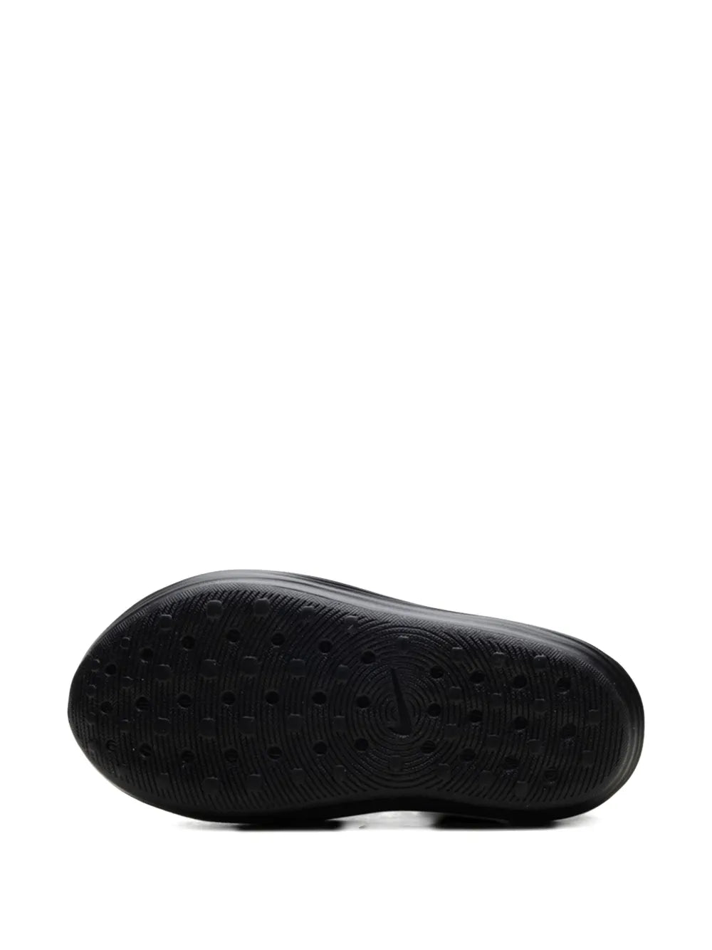 Women's black slip-on clog shoe outsole with textured traction dots