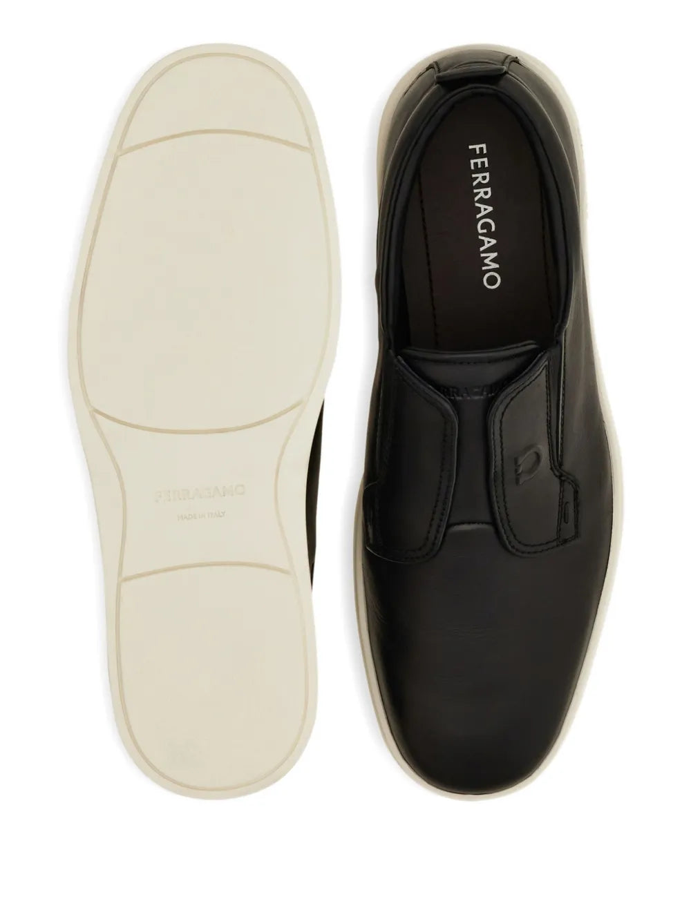 Ferragamo black leather slip-on sneakers with white outsole, underside view