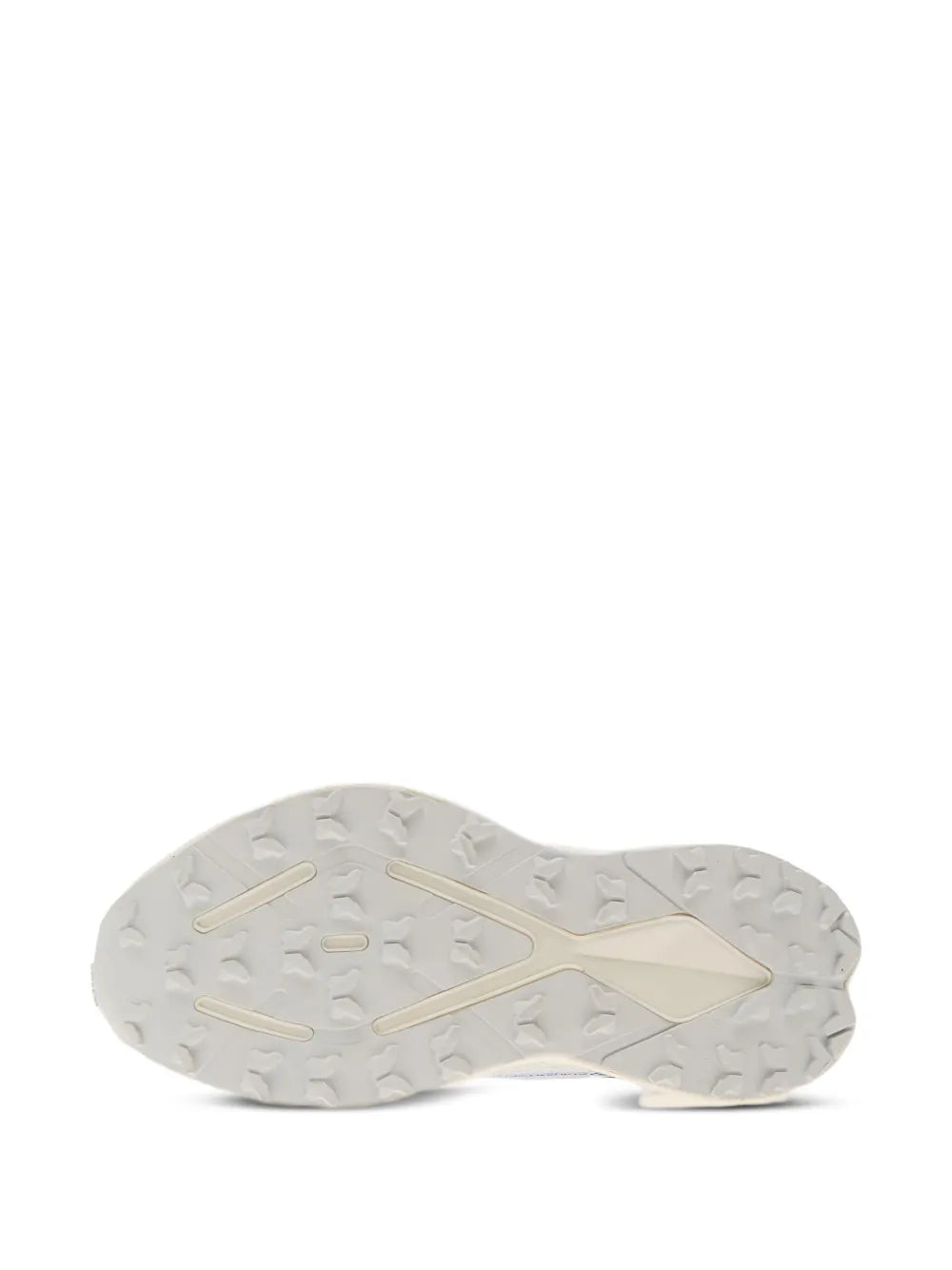 White rubber outsole with rugged tread pattern for trail traction