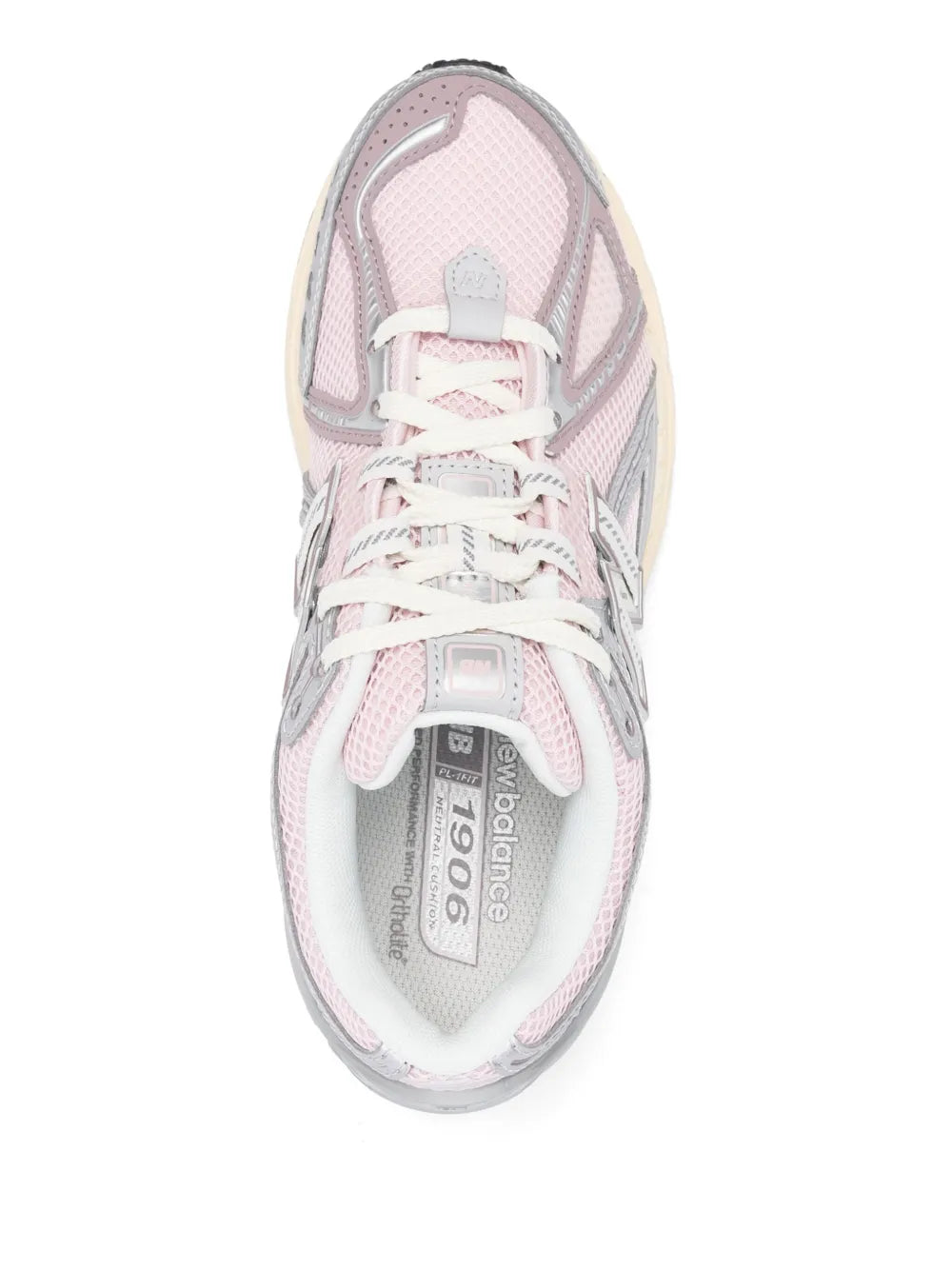 Light pink lace-up sneaker with visible insole, mesh lining, and padded collar