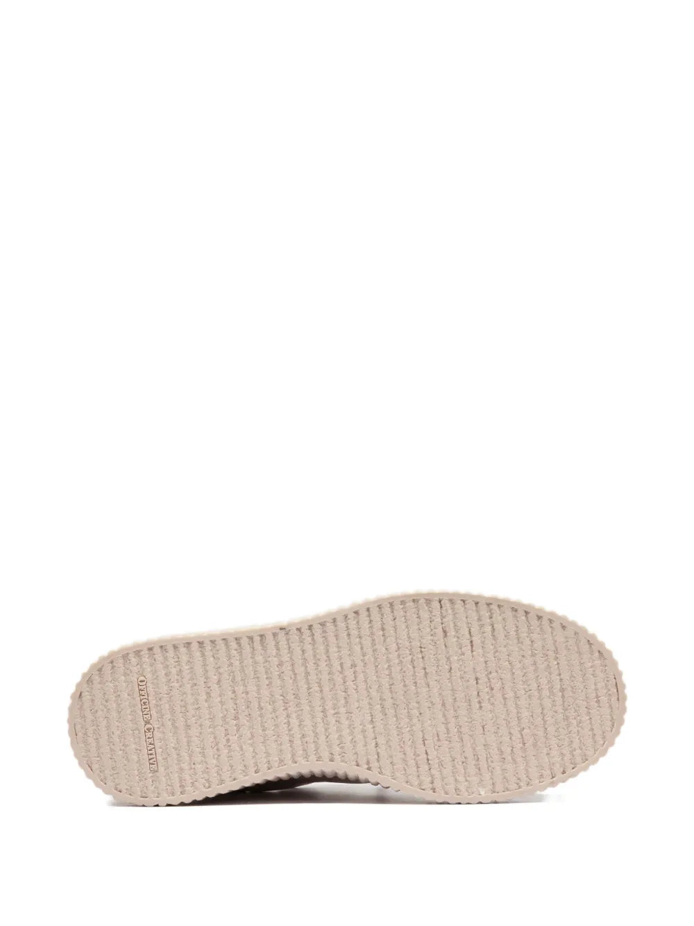 Beige textured rubber sneaker outsole