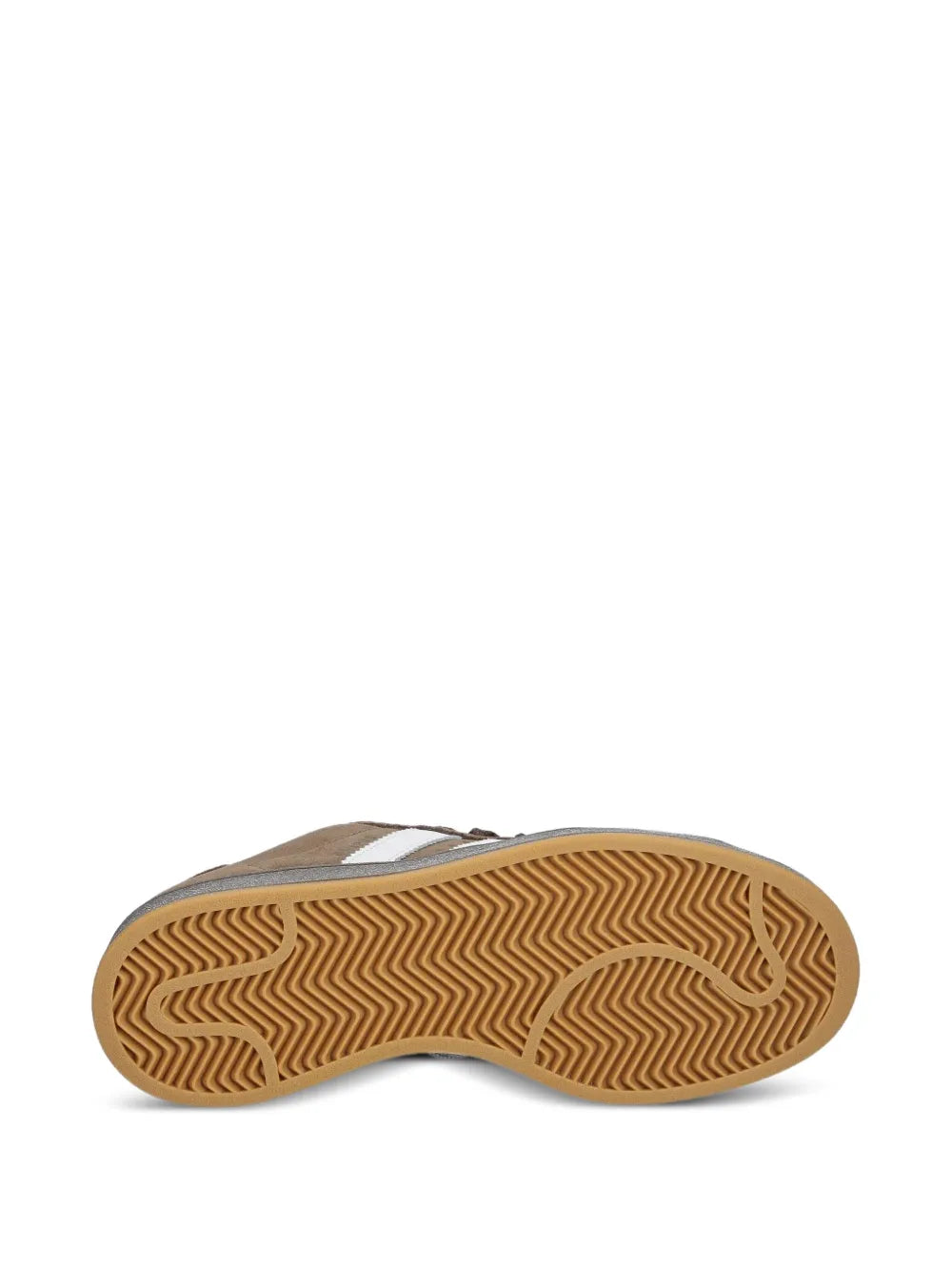 Brown sneaker outsole with zigzag tread pattern