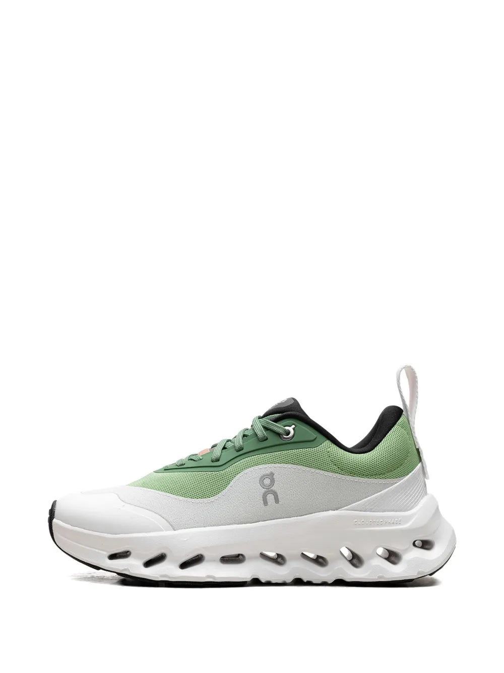 Green and white lace-up sneakers with low profile side panel and rounded toe