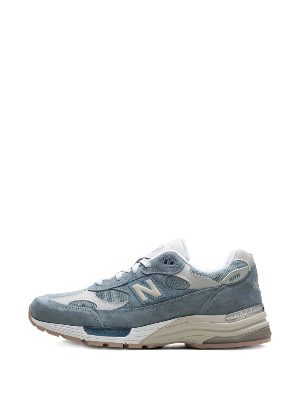 Blue and gray lace-up sneakers with New Balance N logo and KITH heel detail.