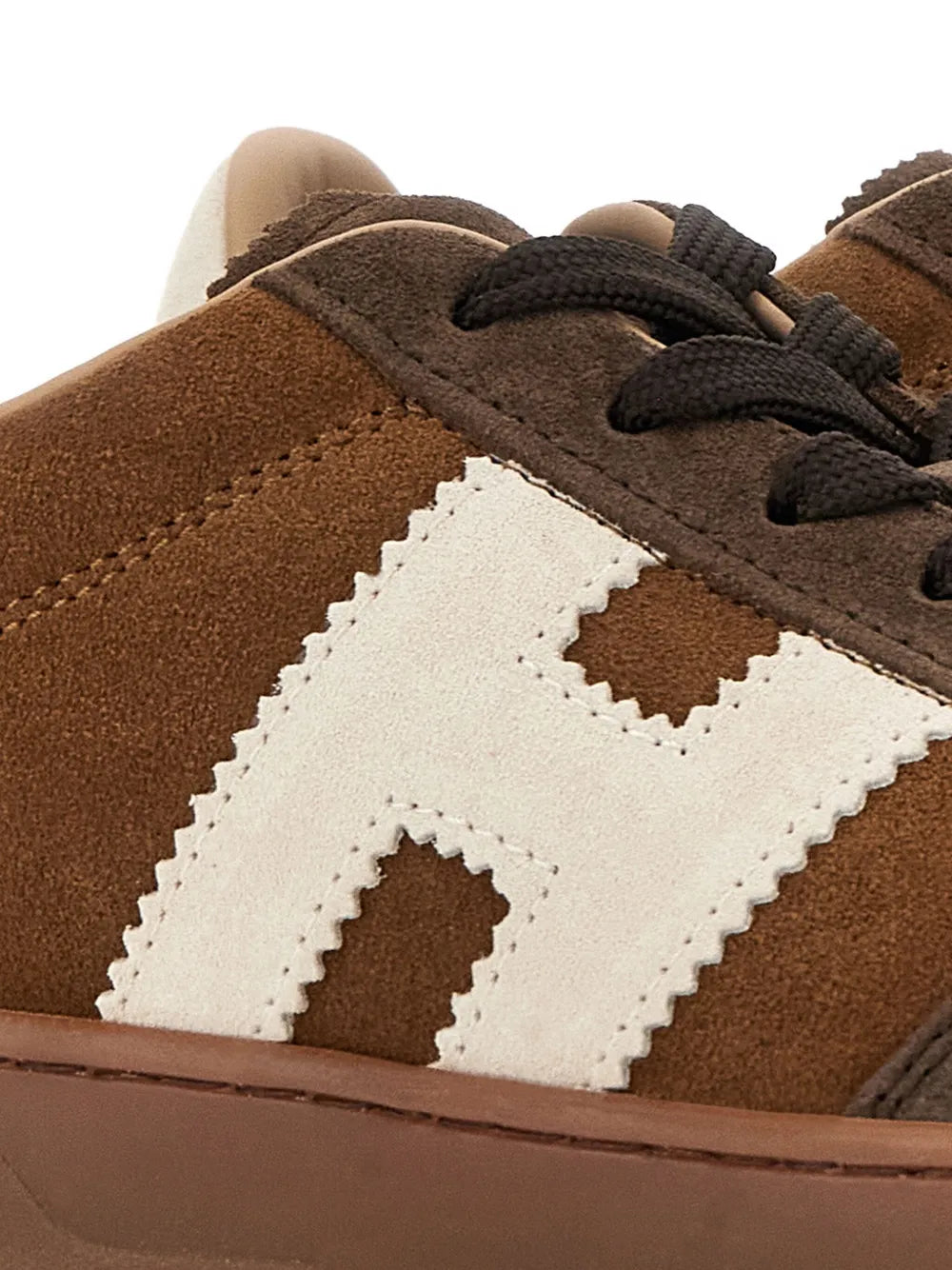 Hogan Cool suede sneaker detail: brown upper with white H logo and stitching