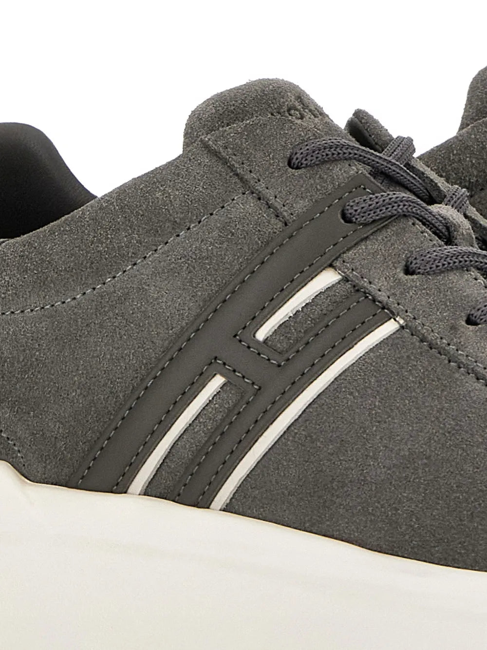 Hogan H580 suede sneakers close-up, dark gray with white side stripe detail