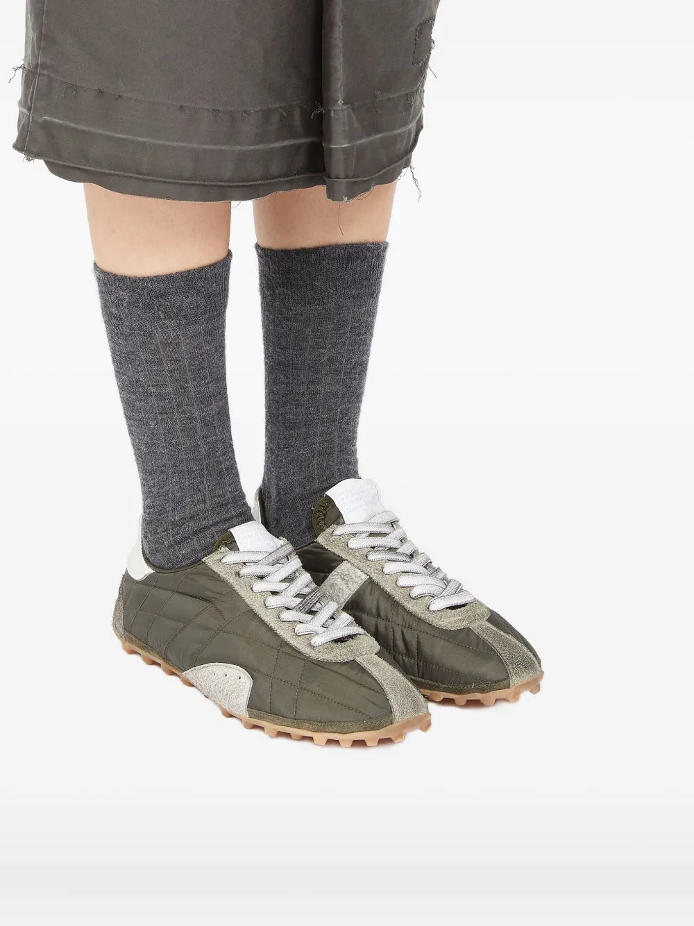 Maison Margiela Sprinters sneakers on feet, olive and tan suede with white laces and gum sole