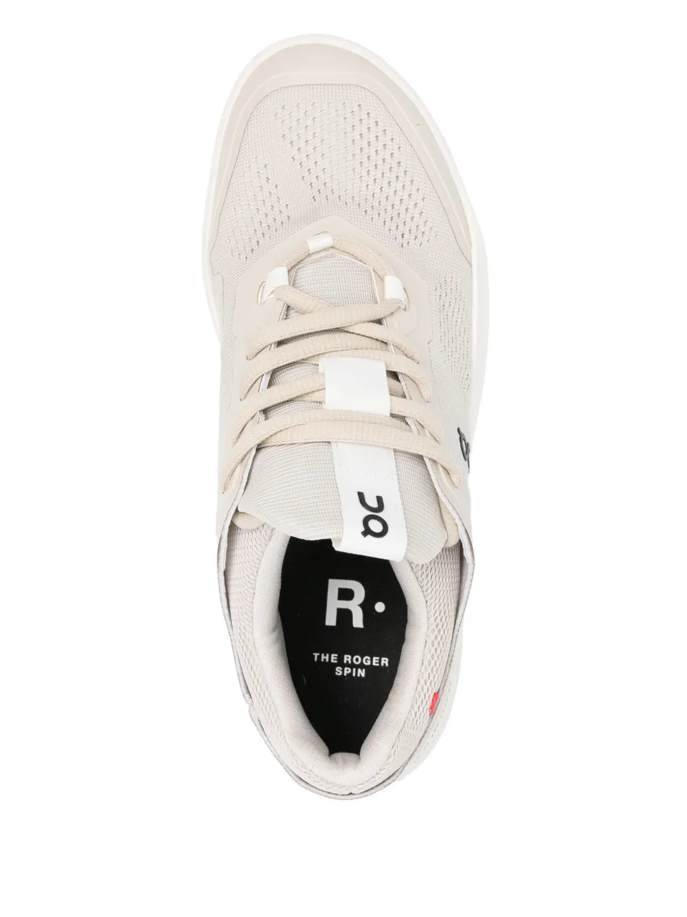 Beige On lace-up sneaker front view with logo tongue and padded collar