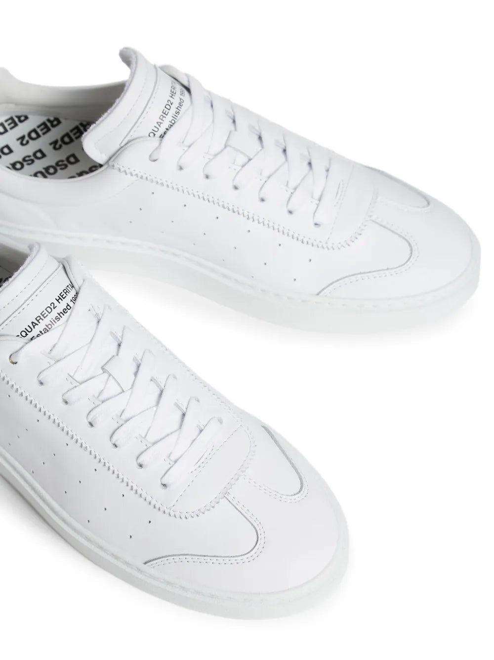 White Dsquared2 lace-up sneakers with stitched panels and detailed laces