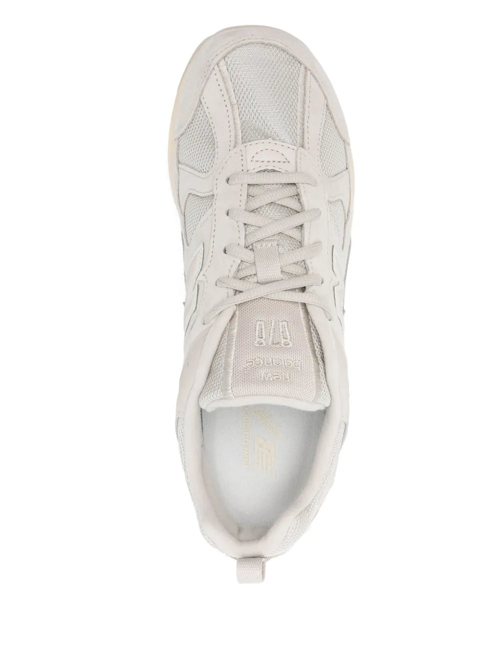 New Balance 878 beige lace-up sneakers, top view of tongue and lace area