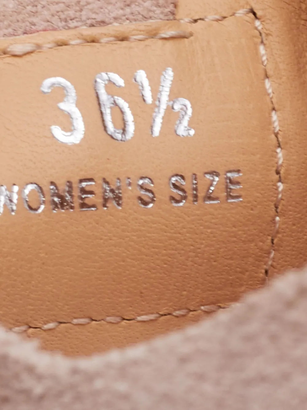 Inside size tag showing 36½ printed on dusty suede lining