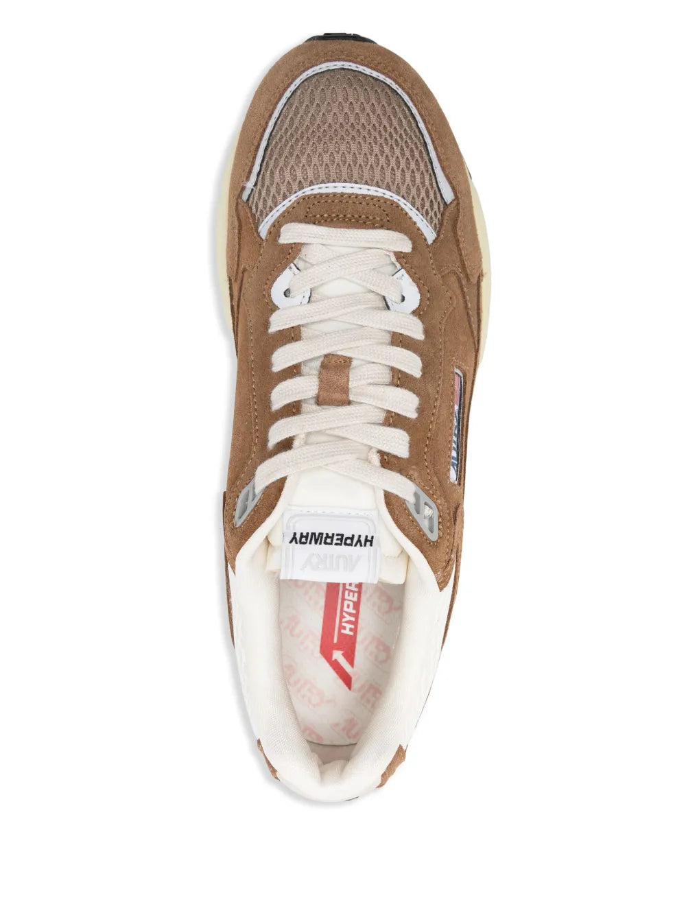 Brown lace-up sneaker with white laces and textile lining, tongue logo visible.