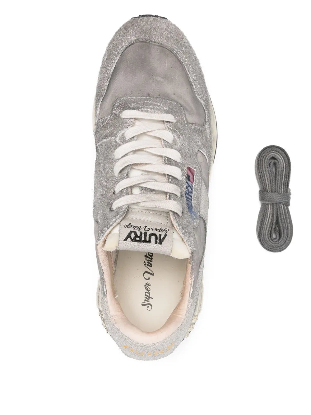 Grey suede-leather lace-up sneakers with insole text and padded collar