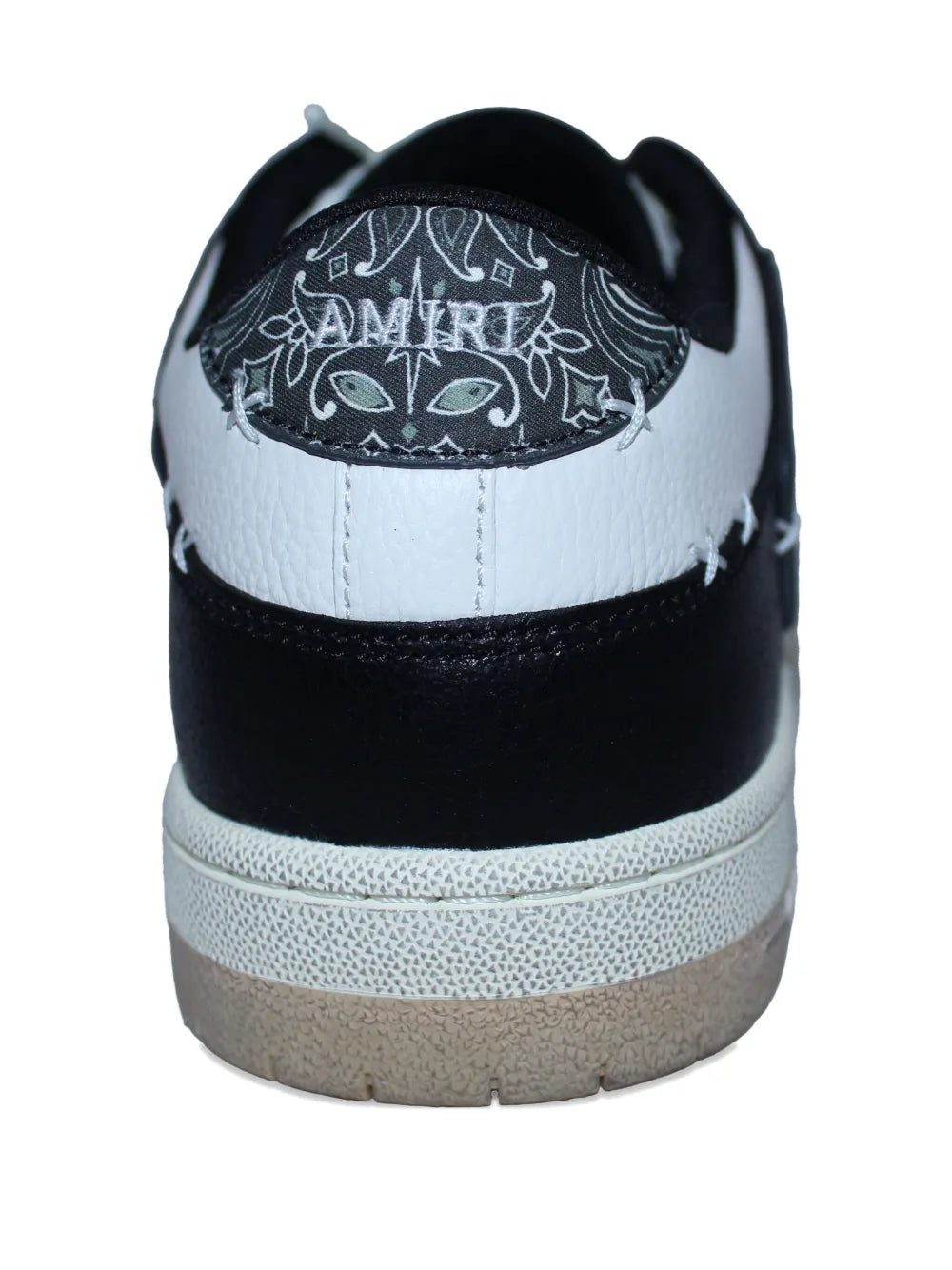 Back view of black and off-white low-top sneakers with embroidered heel lining and sole