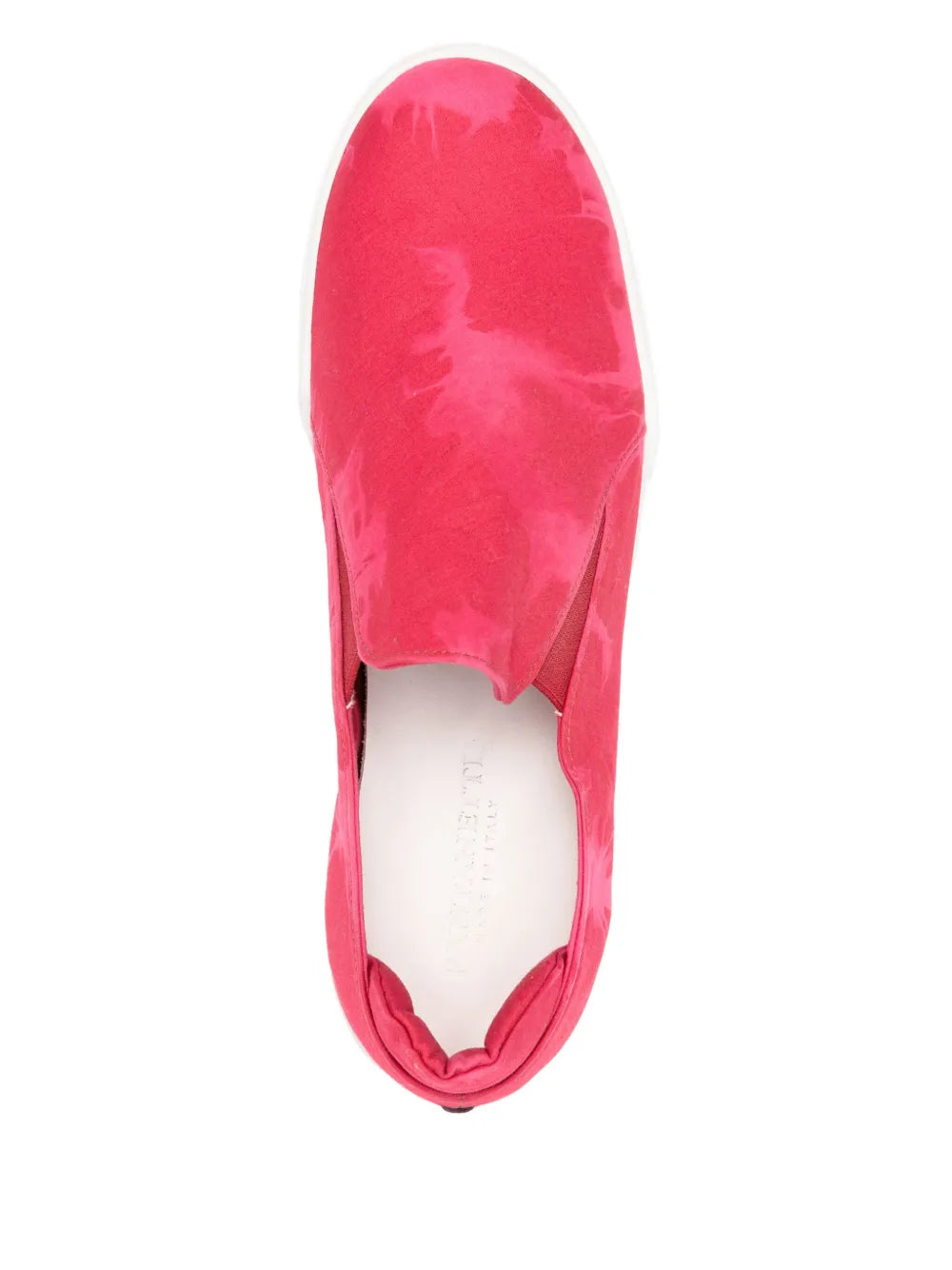 Pink tie-dye slip-on shoe top view with white interior lining