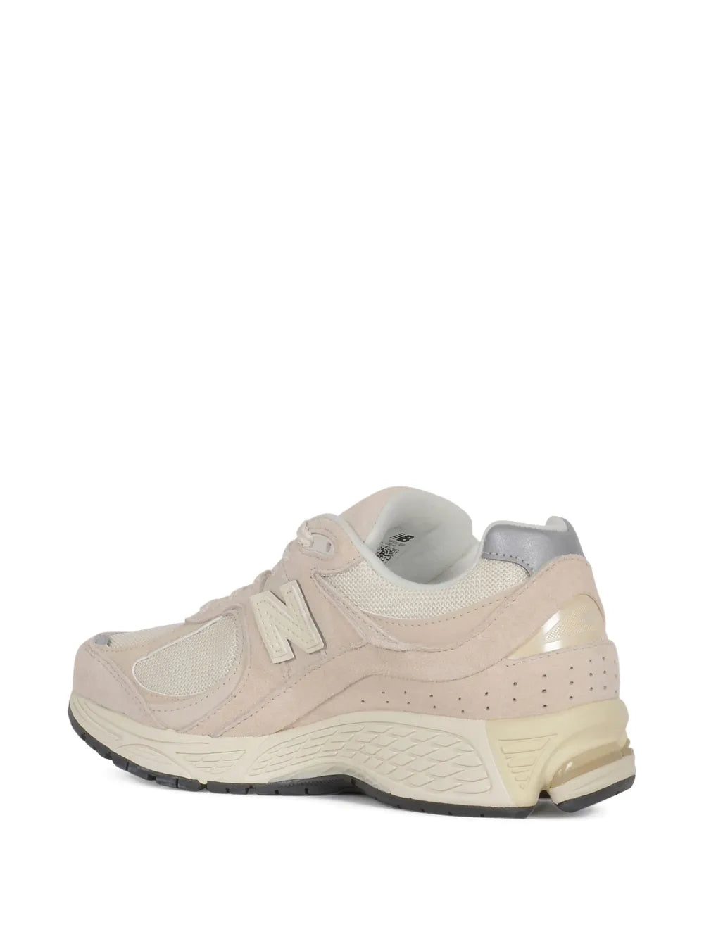 New Balance 2002R beige suede sneaker, rear view with cushioned collar and N logo