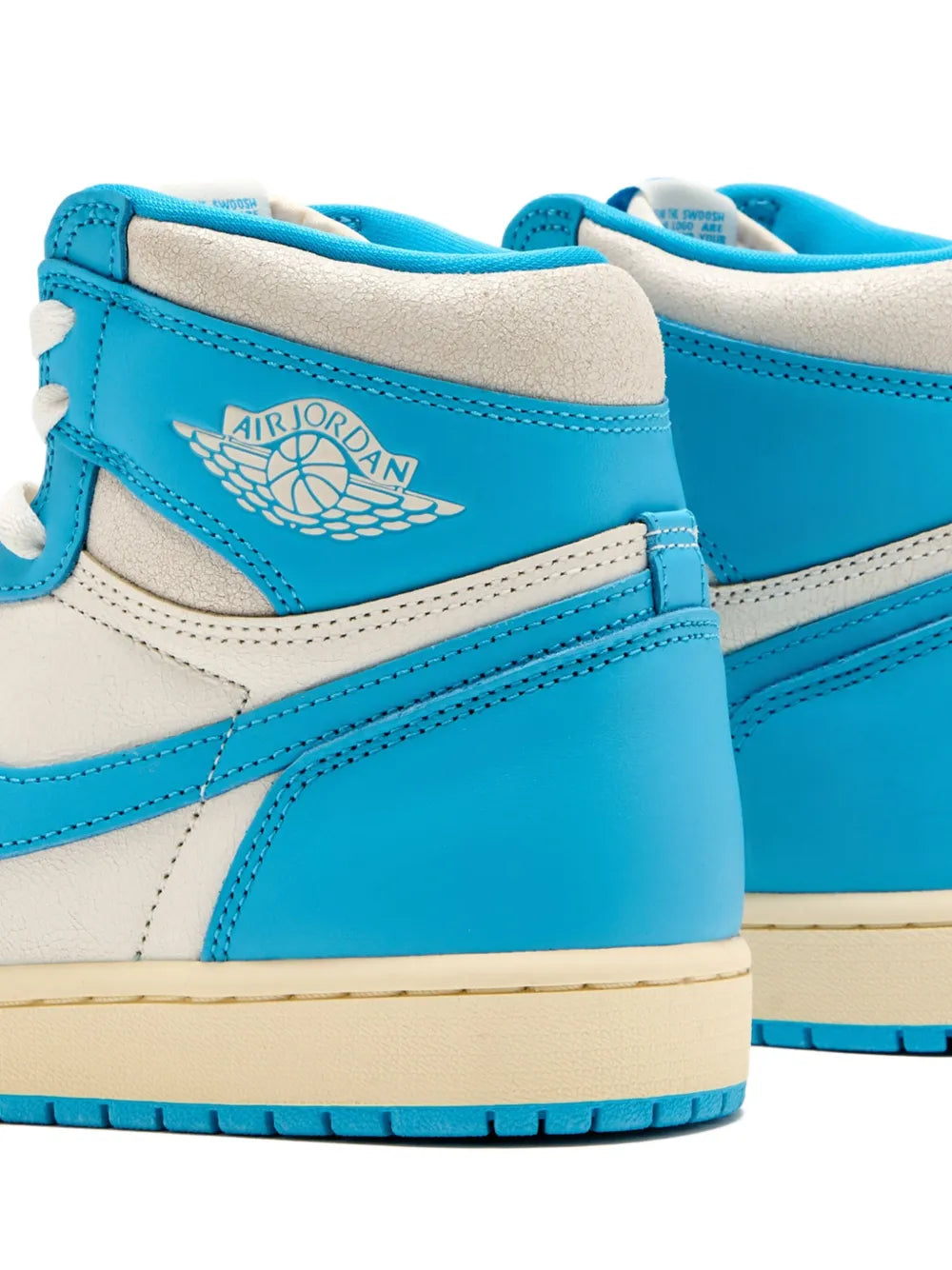 Blue and white high-top sneaker heel with Air Jordan Wings logo