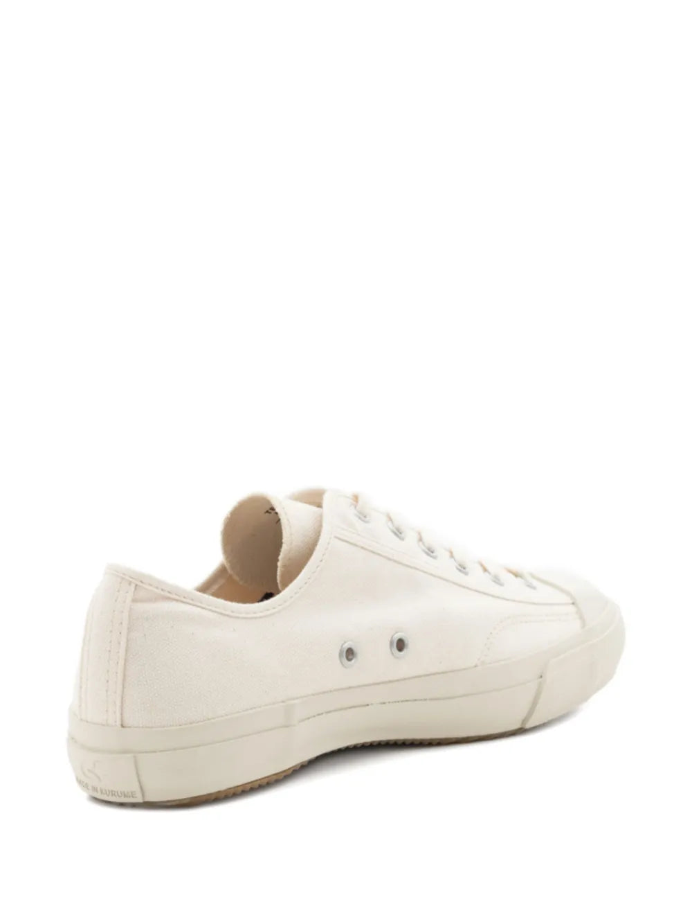 White canvas lace-up sneakers, heel view with rubber cup sole