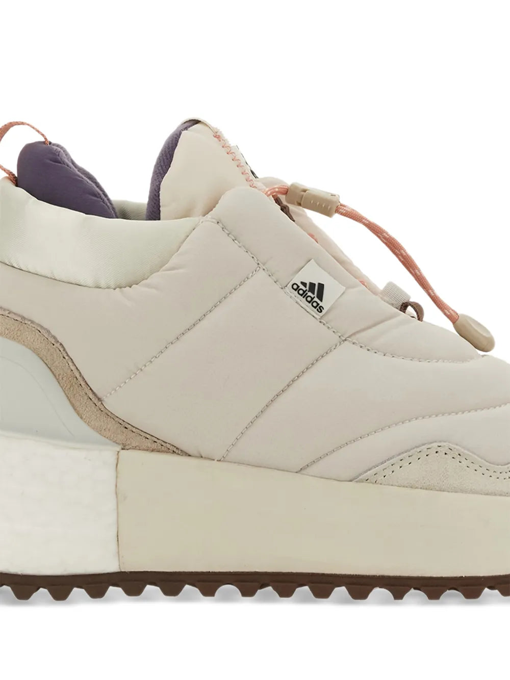 Beige quilted adidas sneaker upper with lace-up eyelets and brown side panel