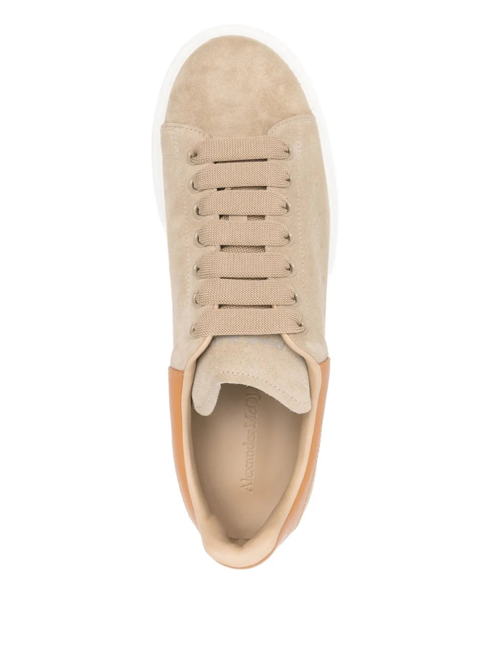 Beige suede lace-up sneakers with visible tongue and white rubber sole.