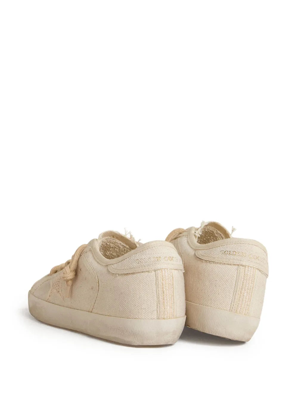 Beige lace-up sneakers rear view with padded heel and back panel