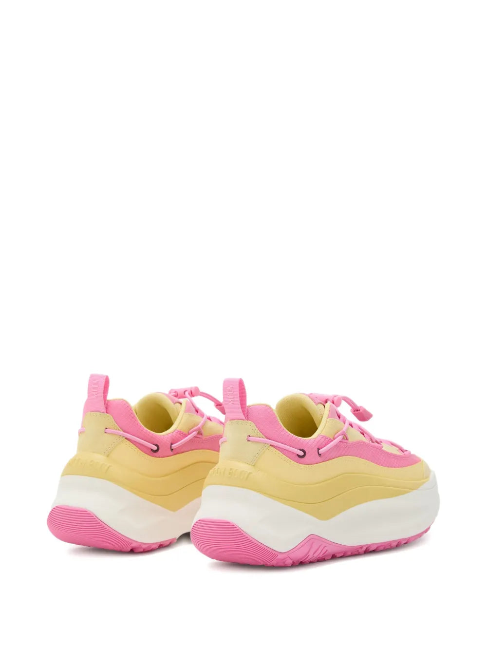 Pair of pink and yellow chunky lace-up sneakers, rear angle with thick sole