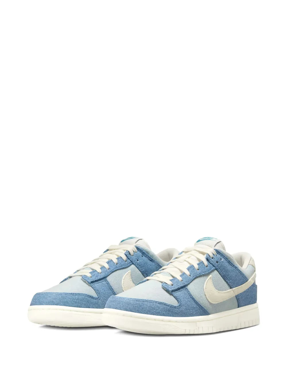 Nike low-top sneakers, blue and cream, lace-up pair with swoosh and cupsole