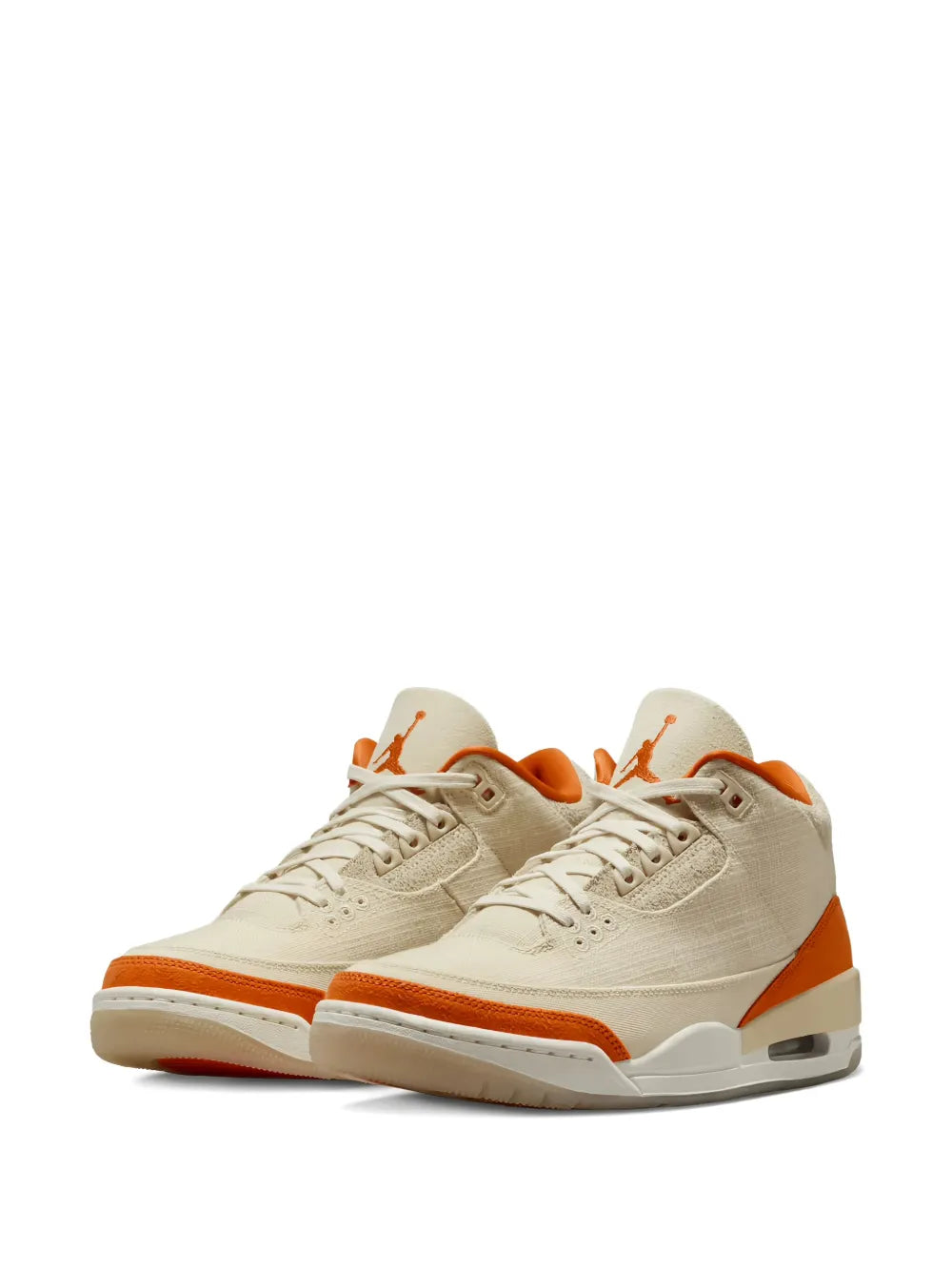 Air Jordan 3 sneakers, beige upper with orange heel and lining, lace-up mid-top pair.