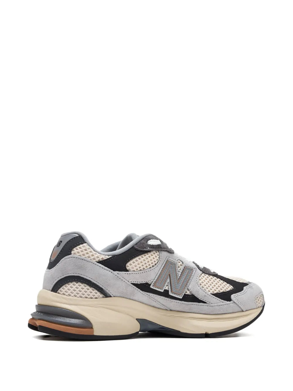 Grey New Balance low-top sneakers with panelled uppers, lace-up closure, chunky sole.