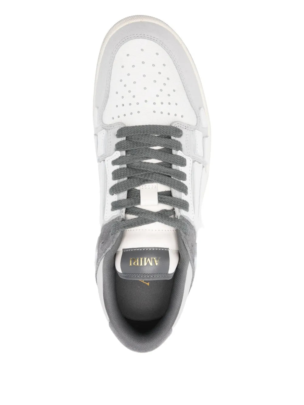 Grey and white low-top sneakers top view with lace-up front and perforated toe box