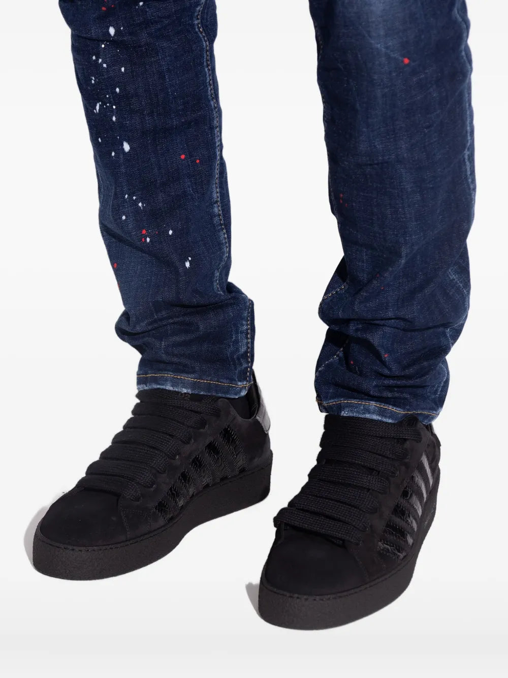 Dsquared2 black panelled sneakers on model with blue jeans; lace-up