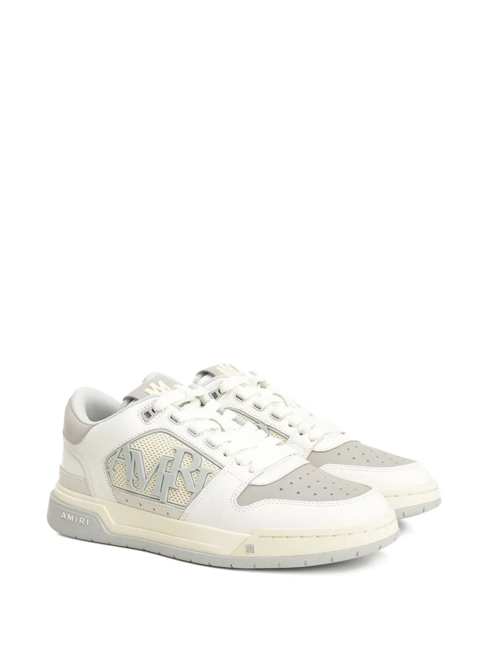 Light grey leather lace-up low-top sneakers, front side view with AMIRI logo patch