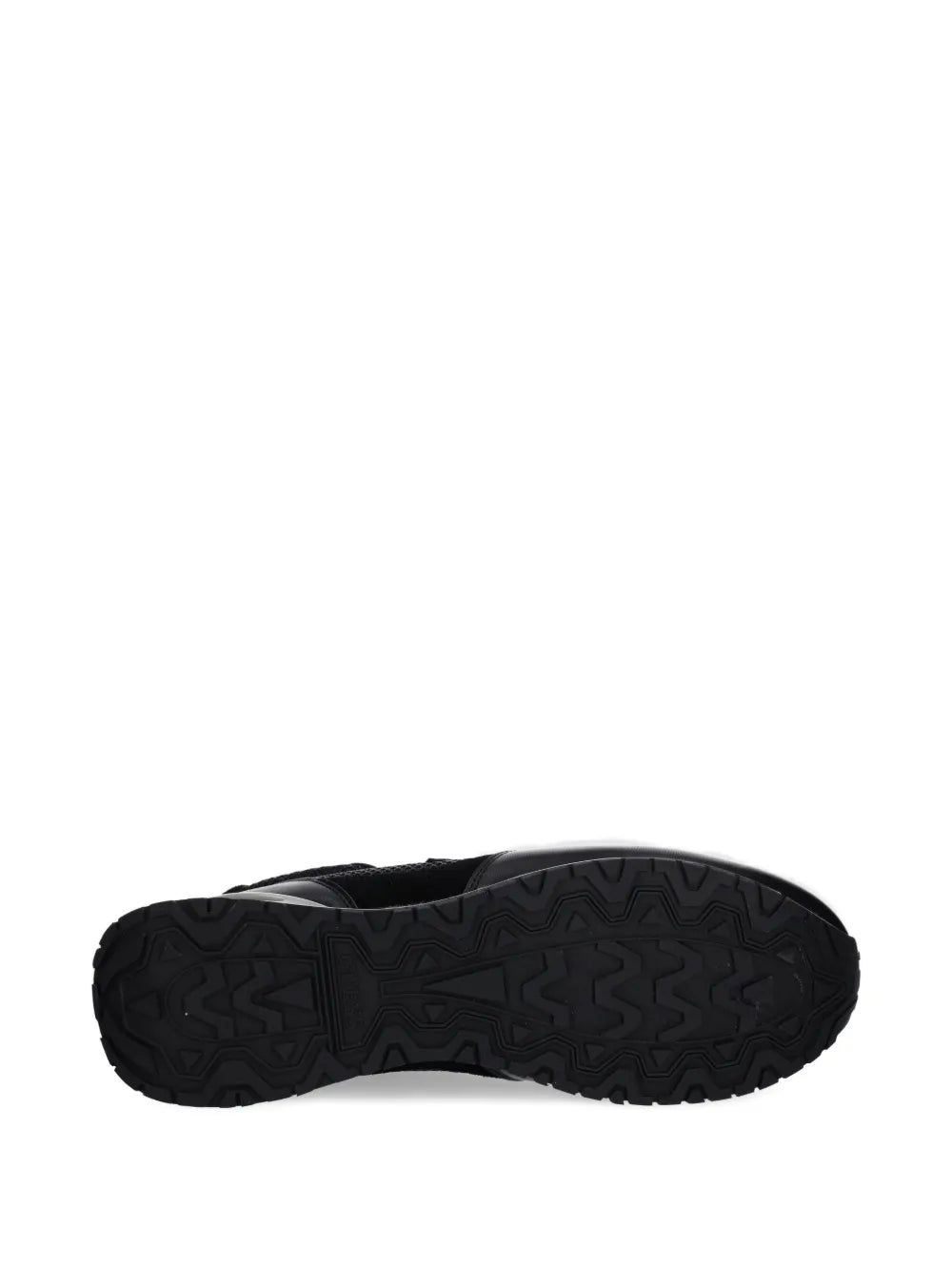 Black sneaker outsole with textured tread pattern