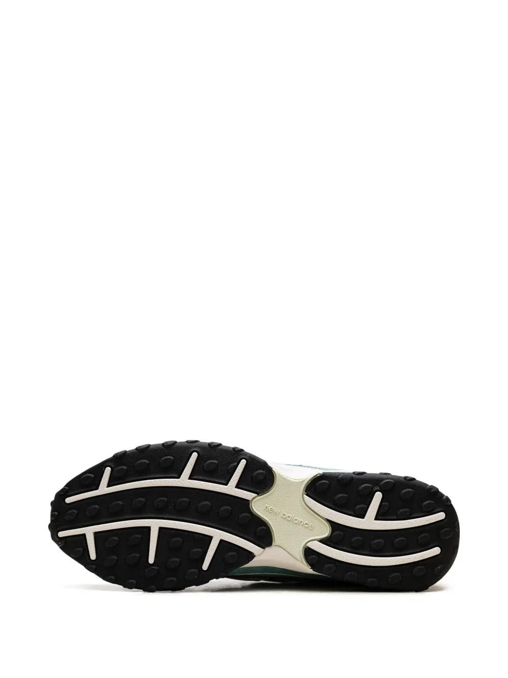 New Balance 204L sneaker outsole, black tread with teal green side panels
