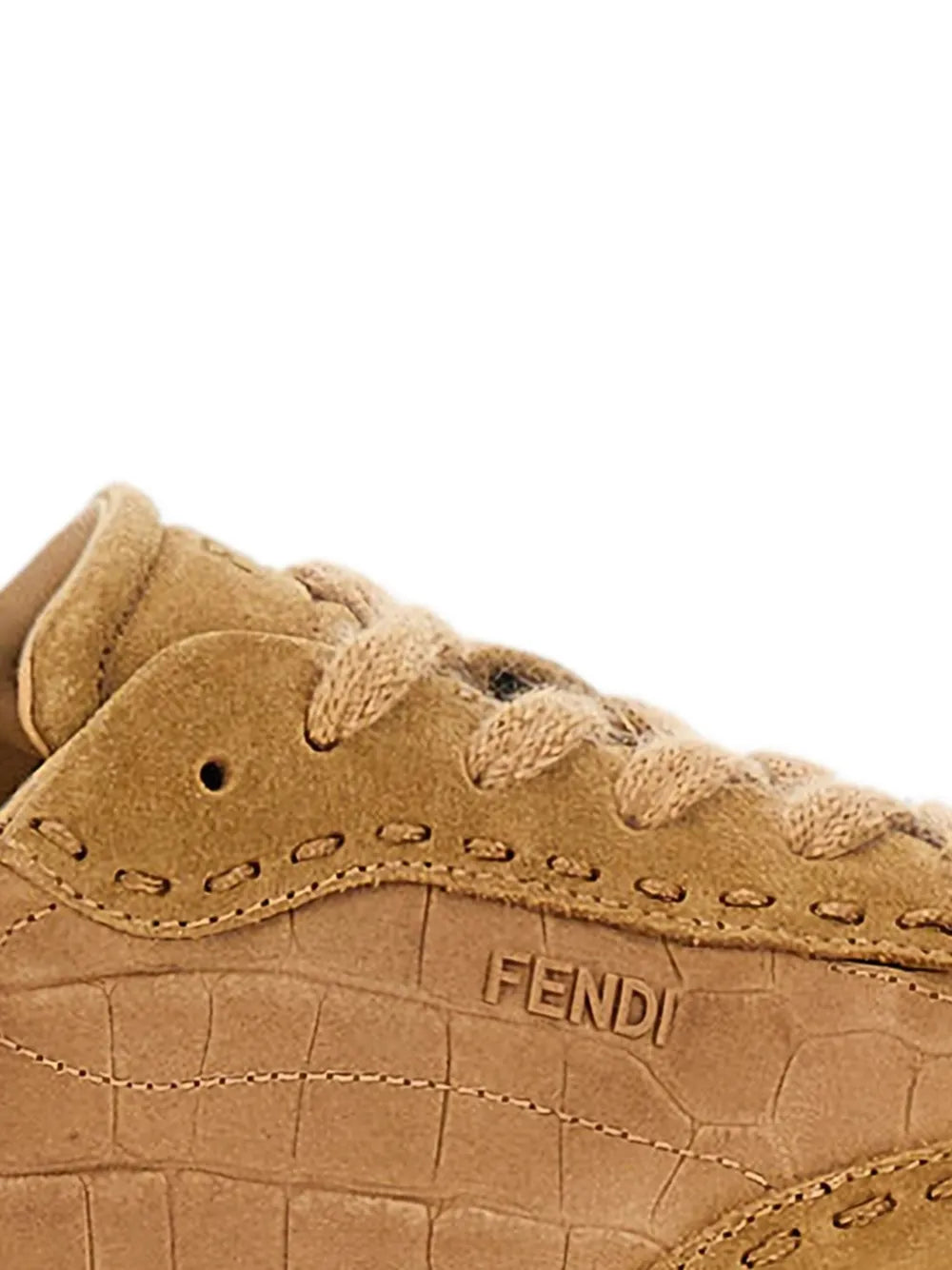 Beige Fendi sneakers close-up: FENDI logo on crocodile-effect panel