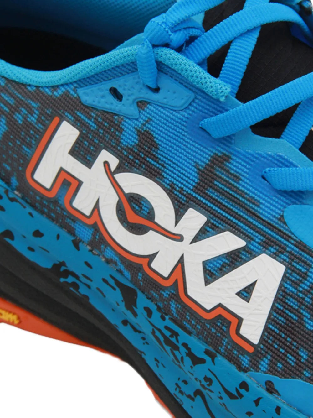 Hoka Speedgoat 6 blue upper close-up with HOKA logo and textured pattern