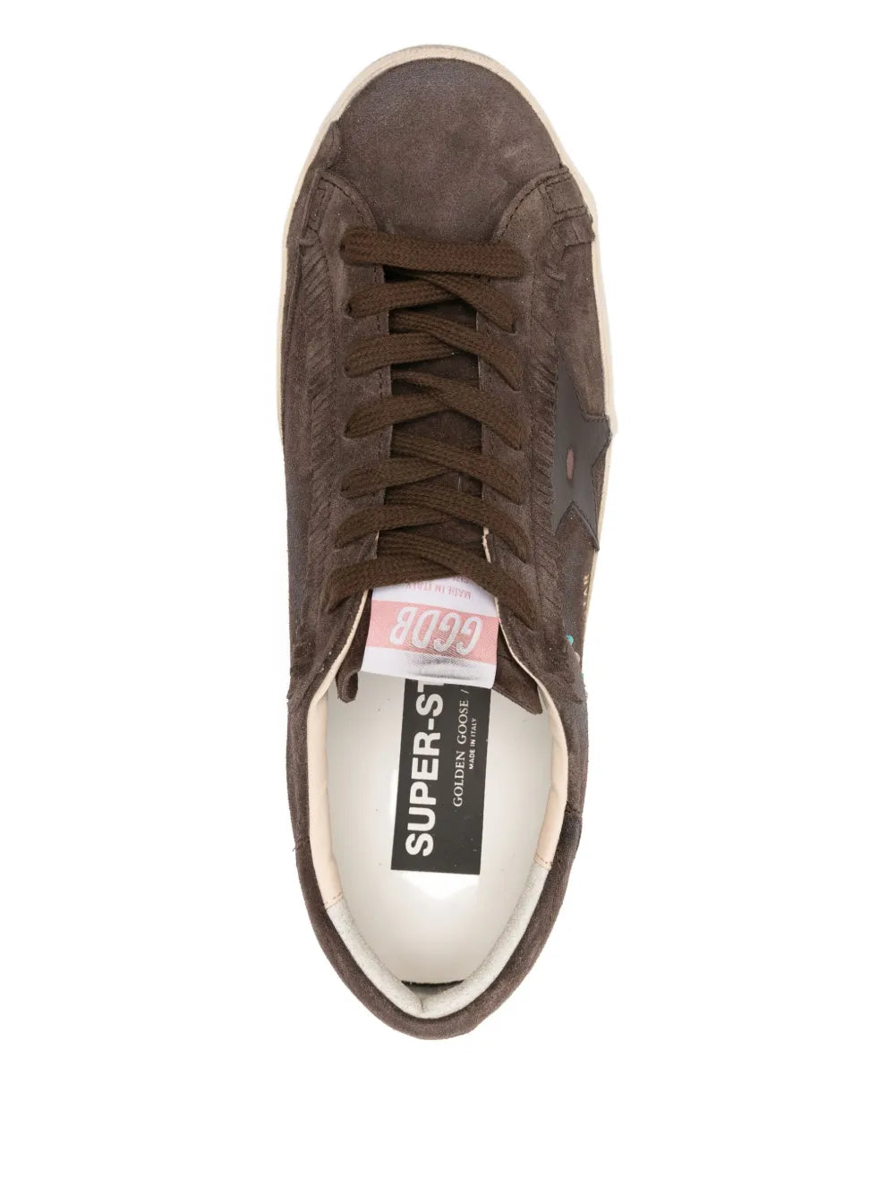 Dark brown suede sneakers, lace-up interior view with Super-St logo insole