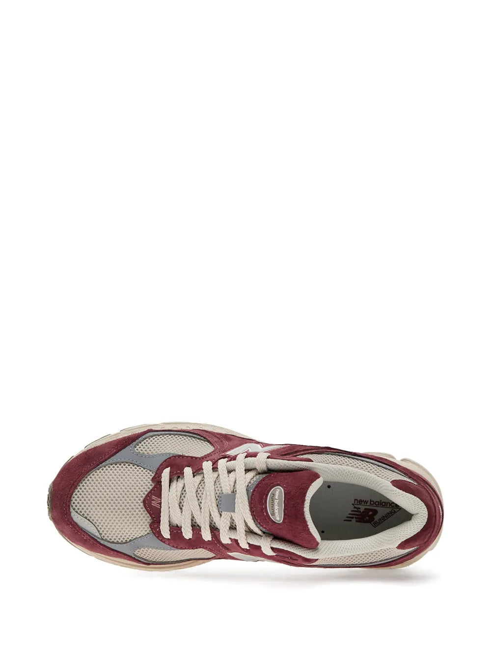 Red suede New Balance 2002R sneaker with lace-up front and mesh toe panel